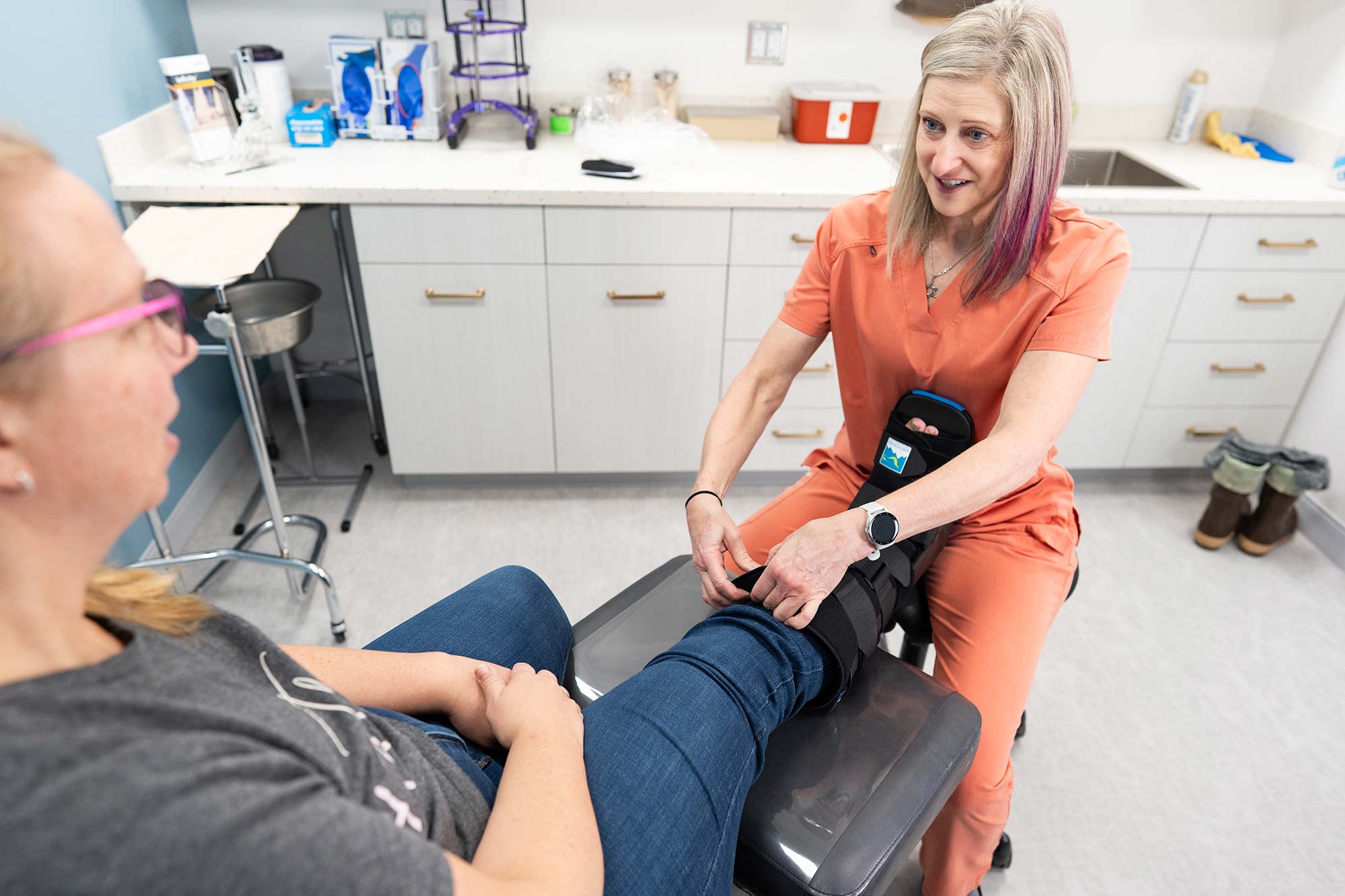 Dr. Kauffman treating a walk-in patient for a foot injury
